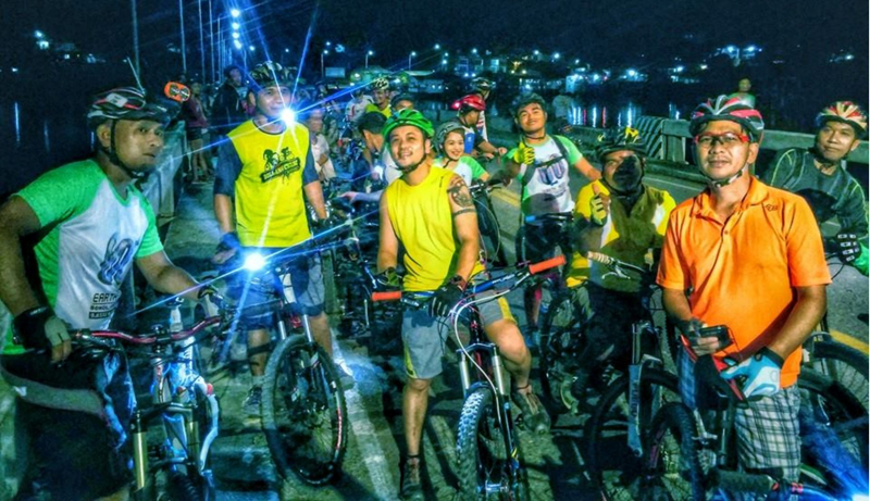 Off grid. With the light from their blinkers, the raw power of their legs and the determination to spread awareness to help the earth by making a statement against fossil fuel, Bol-anon Cyclist: a closed group of bike enthusiasts pedaled through city streets to impress the advocacy for the environment during the Earth Hour. (photo by Christophe JC H Lamotte/PIA Bohol)