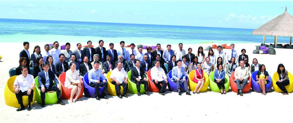 GLOBAL delegates of teh United Nations World Tourism Organization with 19 countries represented take a pose at the white sandy shoreline of South Palms with DOT Sec. Ramon Jimenez, Jr and Gov. Edgar Chatto welcoming the delegates to the four-day conference.