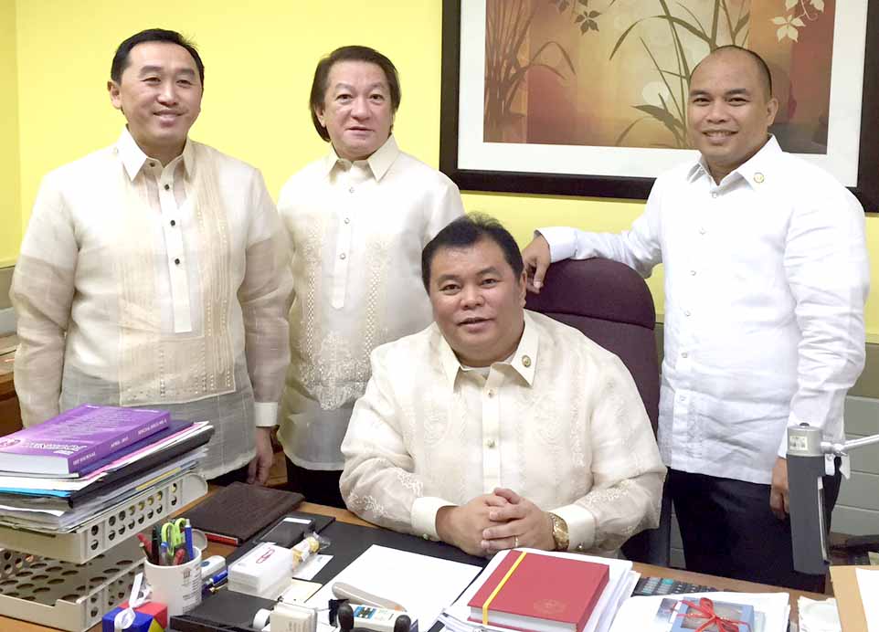 A "unity photo" between Bohol's three congressmen from Left Rep. Arthur Yap of the 3rd district, CHRONICLE Editor Bingo Dejaresco III, Rep. Rene Relampagos of the 1st district and Rep. Aris Aumentado of the 2nd District. Despite the coming election fever, all three vowed to stay "united" for the betterment of Bohol. This photo was taken immediately before the 6th and final SONA of president Noynoy Aquino at the Batasan Pambansa Monday July 27.