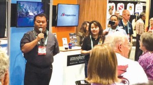 IN USA. - Rep. Rene Relampagos chair of house tourism committee delivers a short message at the Philippine Pavilion at the DEMA Show 2015 in Florida.
