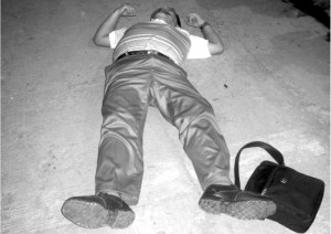 POLITICAL? The lifeless body of  Engr.Ermelando Torregosa after he was gunned down Monday night near McDonalds in Tubigon town.