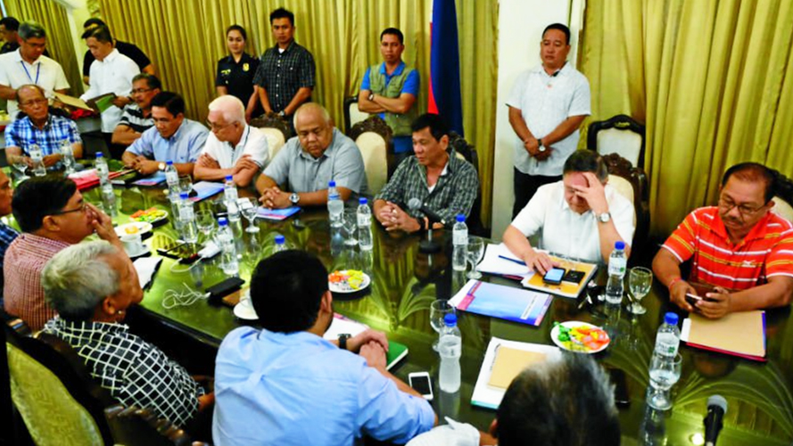 OFFICIAL FAMILY President-elect Rodrigo Duterte presents newly appointed members of his Cabinet during a press conference at MalacaÃ±ang of the South in Panacan, Davao City. TARRA QUISMUNDO