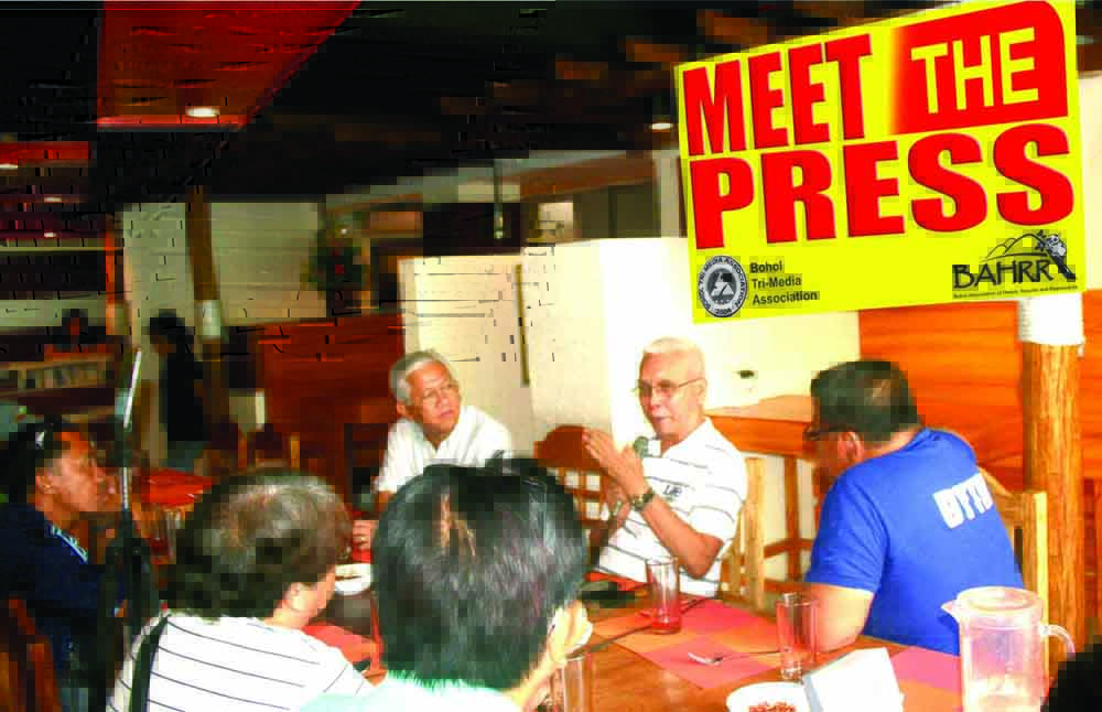 DUTERTE'S TRUSTED MAN. Cabinet Sec. Leoncio "Jun" Evasco, (center) a Boholano, was yesterday's guest of "Meet the Press" of the Bohol Tri-Media Association. He is flanked by Peter Dejaresco and Lito Responte of dyRD and dyTR, respectively. The presscon at Gustus Resto was moderated by "Inyong Alagad" anchorman Chito Visarra.