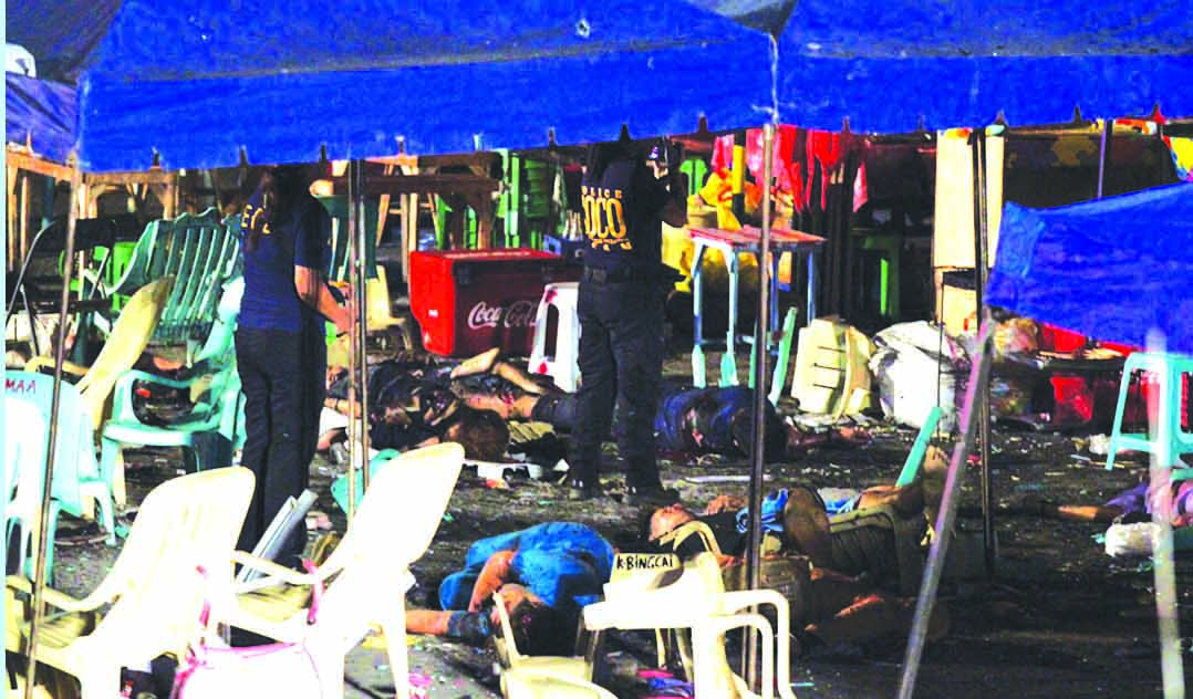 DAVAO CARNAGE. Hideous bombers blasted the peaceof the Davao City Night Market with an (IED) improvised electronic devise bomb Friday night -killing 14 people and inuring 67 people, 17 of them critical. President Digong Duterte immediately issued a "State of Lawlessnees" all over the country and canceled his Brunei trip on Monday. The AFP is now on full alert. (Foto grab from FB)